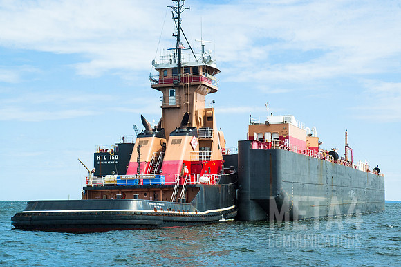 Tug Boat Pushing Oil Barge