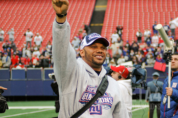 Brandon Jacobs take s the field | Super Bowl XLII Celebration at Giants Stadium