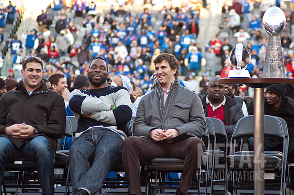 Justin Tuck and Eli Manning  | Super Bowl XLVI Celebration at MetLife Stadium