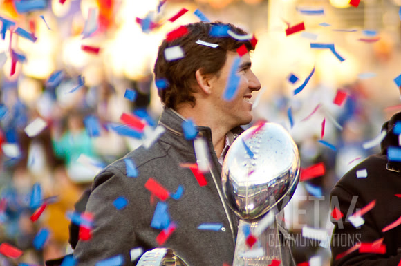 Eli Manning Poses with the Super Bowl XLVI Trophy | Super Bowl XLVI Celebration at MetLife Stadium